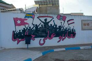 6.11.23 el jem, Túnez calle Arte político pintada en paredes en ciudad de el jem Túnez foto