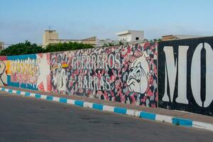 6.11.23 El Jem, Tunisia Street art  Political Graffiti on walls in City of El Jem Tunisia photo
