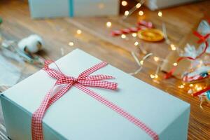 Christmas composition with present box. Festive gift box inside with red ribbon. photo