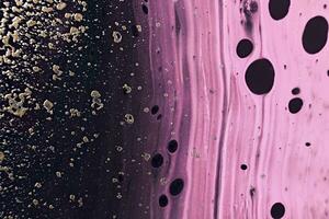 Fluid Art. Golden metallic particles and pink waves. Marble effect background or texture photo