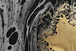 Fluid Art. Metallic gold and gray abstract waves on Black background. Marble effect background or texture photo