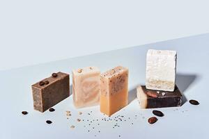 Natural soap bars with ingredients. Diy cosmetics products. Spa bath still life, isometric view photo