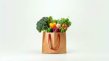 ai generado papel bolso lleno por vegetales y frutas aislado en el blanco antecedentes foto