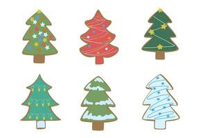 a set of gingerbread cookies in the shape of Christmas trees, painted with colored glaze vector