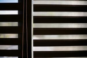 Office blinds. Modern fabric blinds. Office meeting room lighting range control. photo