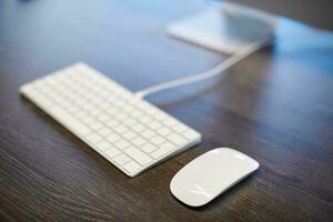 Keyboard and mouse on office table. Modern minimal workplace for study. Empty copy space. photo