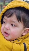 Cute Asian Pakistani Baby Ahmed Mustafain Haider is Enjoying The Beautiful Sunny Day at Wardown Public Park of Luton Town of England UK. Image Was Captured on 03-April-2023 video