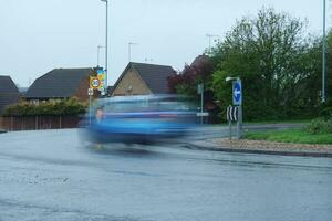 Low Angle View of British Road and Traffic During Rainy Day at Luton Town of England UK. April 24th, 2023 photo