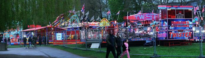 High Angle Footage of Public Funfair Held at Lewsey Public Park of Luton with Free Access for Muslim Community on Islamic Holy Eid Festival Day. April 23rd, 2023 photo