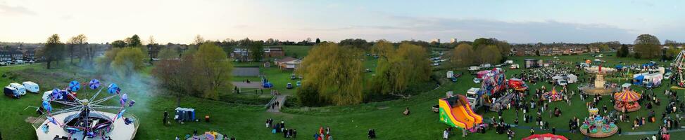 High Angle Footage of Public Funfair Held at Lewsey Public Park of Luton with Free Access for Muslim Community on Islamic Holy Eid Festival Day. April 21st, 2023 photo