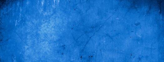 Old wall pattern texture cement blue dark abstract  blue color design are light with black gradient background. photo