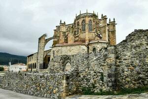 the old church of the monastery of person in the city of person, spain photo