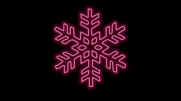 neon snow flakes falling on dark background video