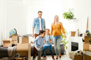 family moving into their new home photo