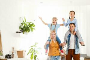 family moving into their new home photo