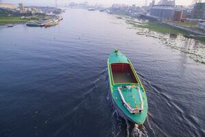 Aerial view Landscape of Sand bulkheads ships with Industrial zone in Sitalakhya River, Narayanganj, Bangladesh photo