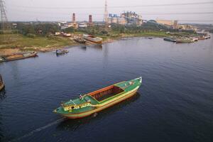 Aerial view Landscape of Sand bulkheads ships with Industrial zone in Sitalakhya River, Narayanganj, Bangladesh photo