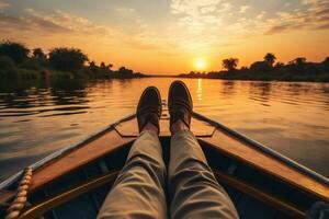 ai generado piernas de un hombre en un barco en un lago a atardecer, un irreconocible descalzo masculino viajero sentado en el borde de un barco durante un crucero en el ondulación Nilo río en contra un despejado foto