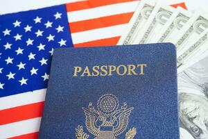 US passport with USA dollar money, American citizen in United States of America. photo