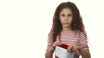 The surprised girl checks a bag with gifts video