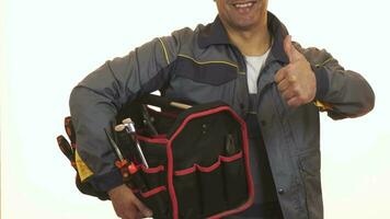 Cropped shot of a constructionist with toolbox showing thumbs up video
