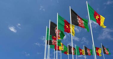 Afghanistan and Cameroon Flags Waving Together in the Sky, Seamless Loop in Wind, Space on Left Side for Design or Information, 3D Rendering video