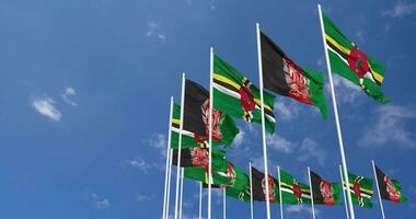 Afghanistan and Dominica Flags Waving Together in the Sky, Seamless Loop in Wind, Space on Left Side for Design or Information, 3D Rendering video