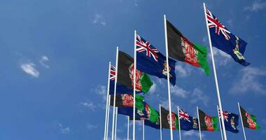 Afghanistan and Cayman Islands Flags Waving Together in the Sky, Seamless Loop in Wind, Space on Left Side for Design or Information, 3D Rendering video