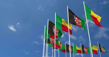 Benin Flags Waving Together in the Sky, Seamless Loop in Wind, Space on Left Side for Design or Information, 3D Rendering video