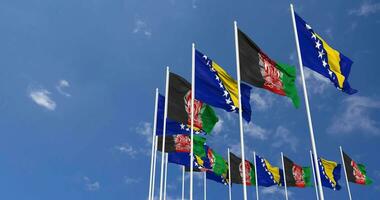 Bosnia and Herzegovina Flags Waving Together in the Sky, Seamless Loop in Wind, Space on Left Side for Design or Information, 3D Rendering video