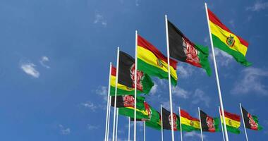Bolivia Flags Waving Together in the Sky, Seamless Loop in Wind, Space on Left Side for Design or Information, 3D Rendering video