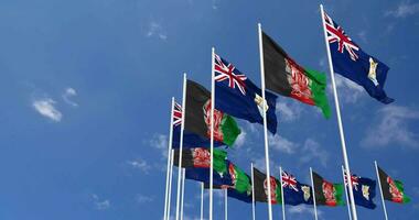 Anguilla Flags Waving Together in the Sky, Seamless Loop in Wind, Space on Left Side for Design or Information, 3D Rendering video