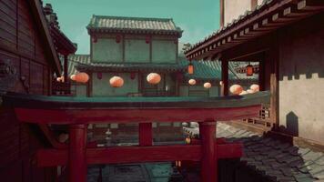 A building with lanterns hanging from it's roof video