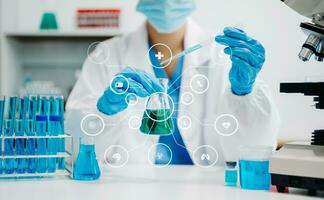 Dctor work on digital tablet healthcare doctor technology tablet using computer in laboratory study with virtual icon photo