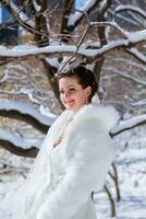 Bride in the winter against the backdrop of New York photo