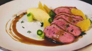 Tasty duck breast with orange and mashed potatoes video