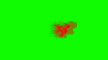 Red Paint Splash each other in Green Background. Colored Ink Spreads and Bursts Like a Colorful Cloud. video