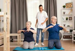 Physiotherapist following the evolution of patients. Home assistance, physiotherapy, healthy lifestyle for senior old person, training and recovery with professional physiotherapist photo