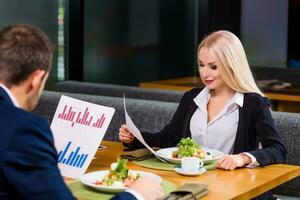 woman and man on business lunch photo