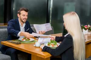 woman and man on business lunch photo