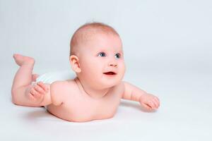 Cute baby girl on white background photo