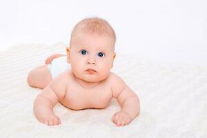 Cute baby girl on white background photo