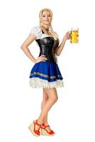 Full length portrait of a blond woman with traditional costume holding beer glasses isolated on white background. photo