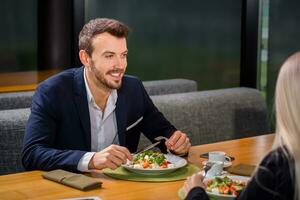 woman and man on business lunch photo