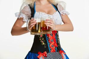 Beautiful young blond girl of oktoberfest beer stein photo