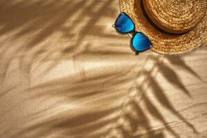 Top view of summer accessories on sandy beach photo