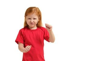 Close-up portrait mad young girl about to have nervous atomic breakdown, fist up in air, angry with someone isolated white background. photo