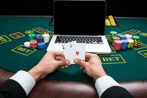 casino, online gambling, technology and people concept photo