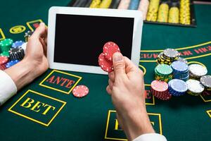 casino, online gambling, technology and people concept photo