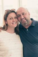 a man and a woman posing for a photo